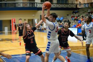Marty Johnson scores 21, as Morgantown High boys' hoops repeat as OVAC champs